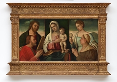 Madonna and Child with Saints and Donors by Francesco Bissolo