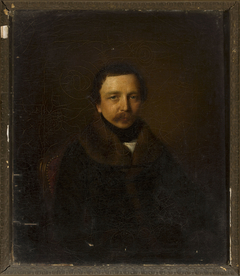 Portrait of a man in a coat with a fur collar