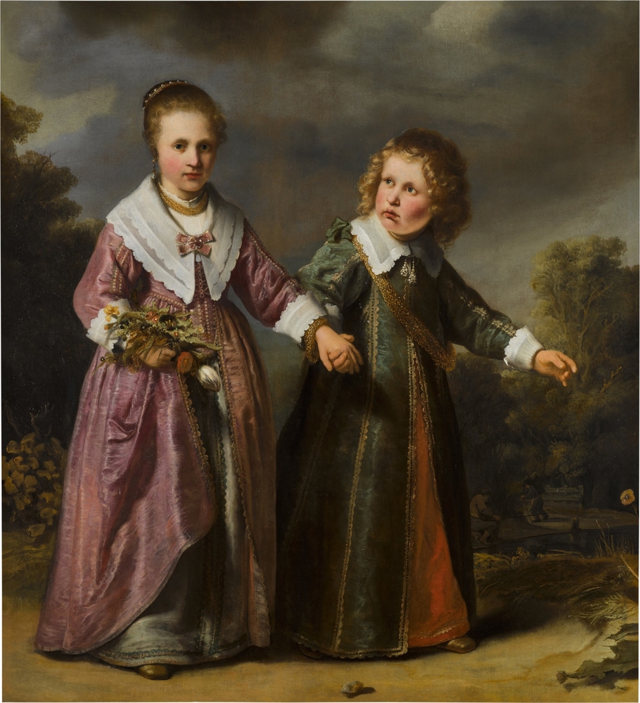 Double portrait of a boy and girl, full-length, in a landscape
