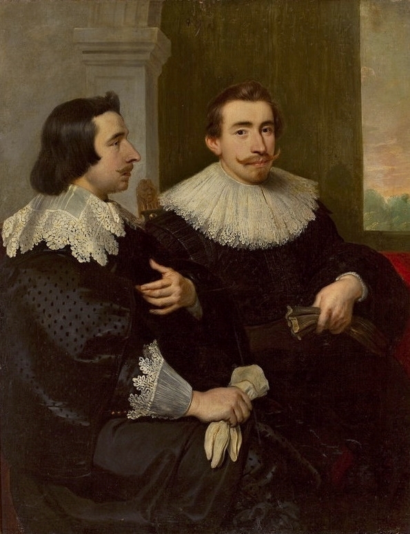 Portrait of two men with gloves.