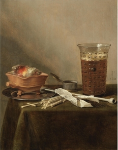 Still life with a brazier, a glass of beer and a clay pipe