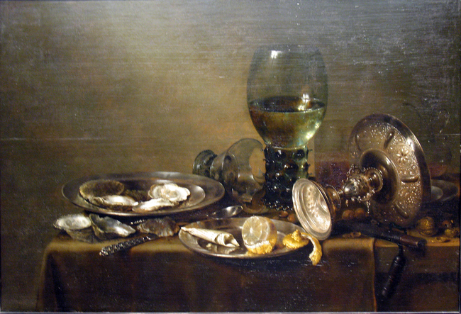 still life with oysters rum glass and silver cup