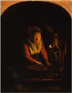 Old Woman in a Window chopping Onions by Gerrit Dou