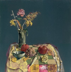 The table with flowers and fruits