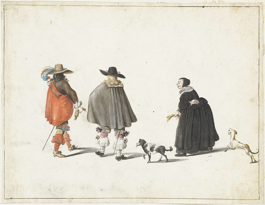 Vrouw in zwart, vergezeld door twee hondjes, pratend met twee heren