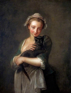 A Girl Holding a Cat