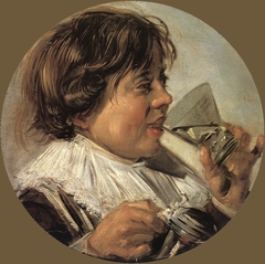Boy with a glass and a tin can