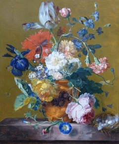 Flower Still Life in a Terracotta Vase with a Bird's Nest on a Marble Table by Jan van Huysum