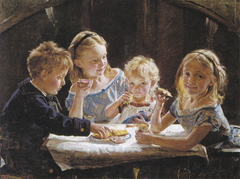 Four children having lunch.
