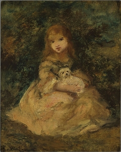 Girl with a dog in her lap