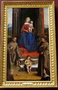 La Vierge et l'Enfant trônant entre Saint François, Saint Antoine et deux donateurs