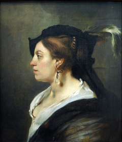 Portrait of a lady in profile by Carel Fabritius