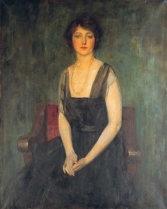 Portrait of Dorothy Duveen seated on a red chair