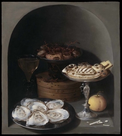 Still Life with Oysters, Sweetmeats and Dried Fruit in a Stone Niche