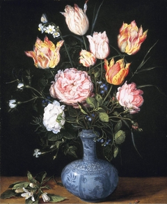 Vase of flowers on a tabletop by Jan Brueghel the Elder
