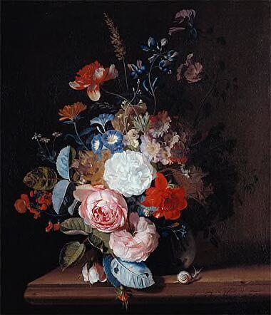 Flower still-life in a glass vase on a stone ledge