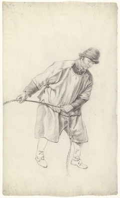Staande man, trekkend aan een touw by Unknown Artist