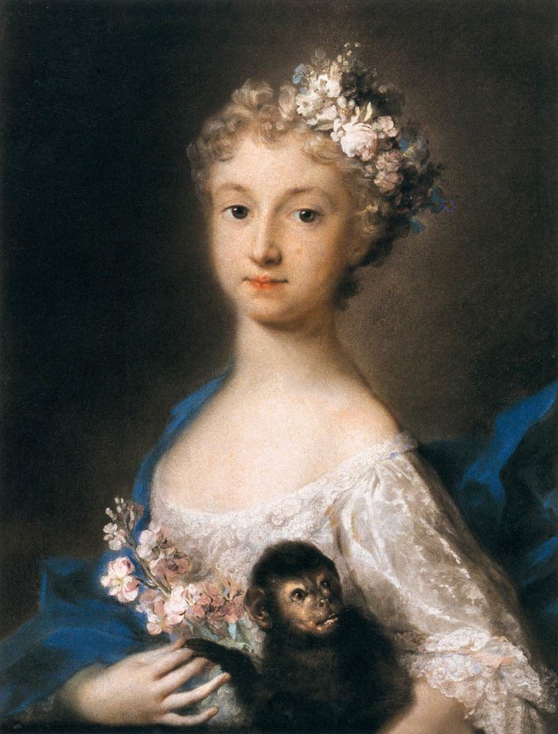 Young Girl Holding a Monkey