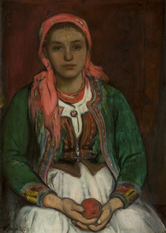 Young woman from the Highlands with an apple