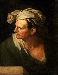 A Man in a Green Cloak with a White Turban
