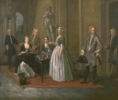 An English Family at Tea by Joseph van Aken