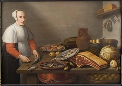 Kitchen piece with woman cleaning a fish