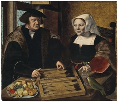 Man and a Woman playing Backgammon