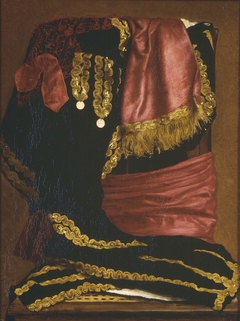 Still life of a toreador's costume draped over a chair by Anton Fock