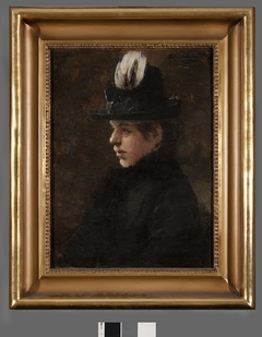 Study of a girl in a hat with a little feather