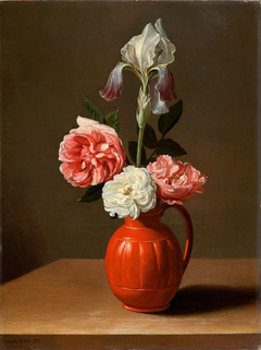 An iris and three roses in an earthenware pot