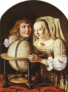 Couple looking at a Globe