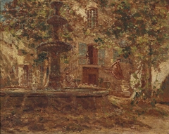 fountain in front of a villa
