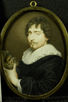 Portrait of a man with a sculpture of a head of Silenus in his hand