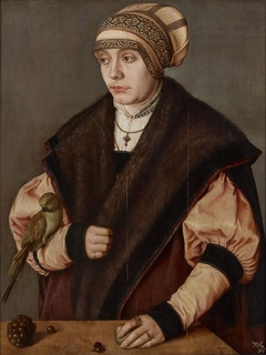 Portrait of a woman with parrot