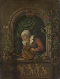 Woman Watering a Plant