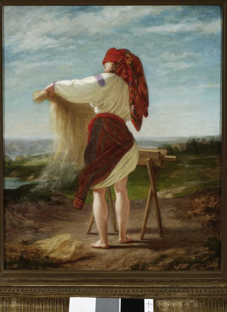 Peasant woman breaking flax