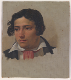 Portræt af en ung mand med rød halsklud
