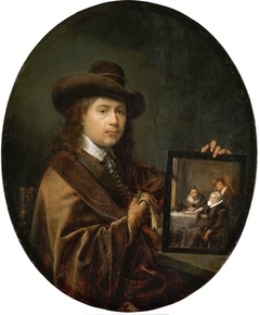 Portrait of the Painter holding a Group Portrait of his Family by Gerrit Dou