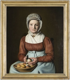 Portret van een dienstmaagd appelen schillend by Cornelis Wester