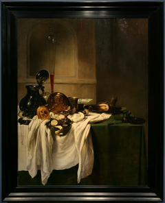 Still life of a laid table with ham and a view of a niche