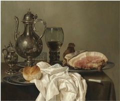 Still life with tazza, silver pot, roemer, glass of beer, four pewter plates with bread and ham on a green table cloth