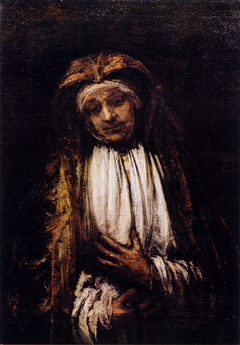 Elderly woman with a rosary