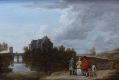 Family in front of a moated castle