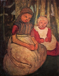 Two sitting girls in the birch forest