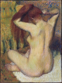 Woman Combing Her Hair by Edgar Degas