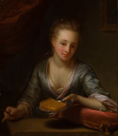 A lady holding a plate