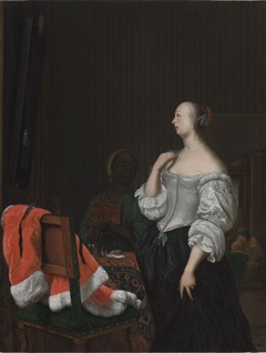 A Woman Standing before a Mirror by Frans van Mieris the Elder