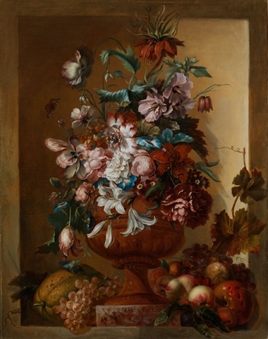 Flowers in a vase set in a stone niche