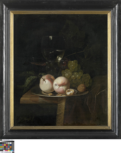 Stilleven met fruit en een wijnglas by Isaac Denies