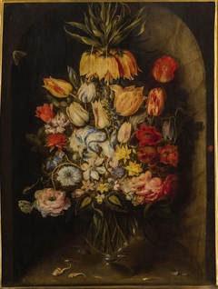 Vase of flowers in a niche by Osias Beert